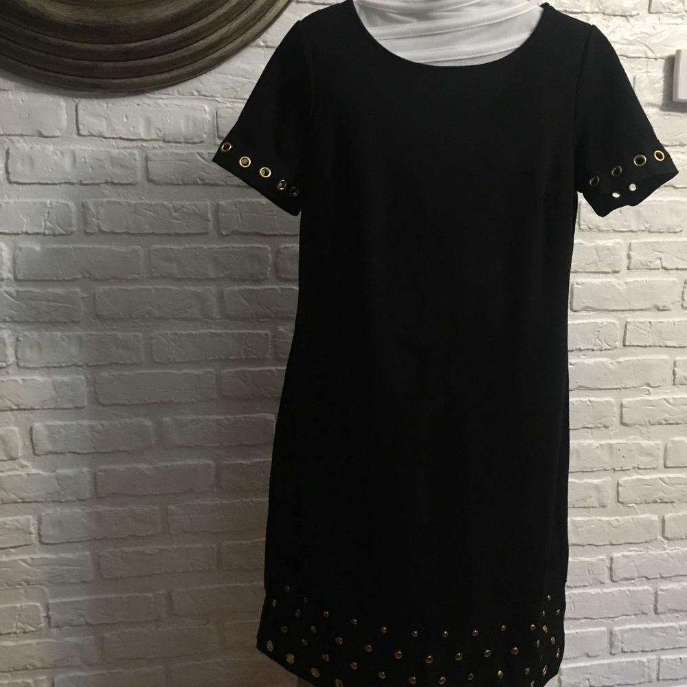 Black dress with gold metal accent dress